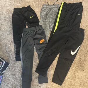 5 pairs of boys size 7 Nike athletic pants